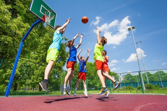 Kids playing basketball