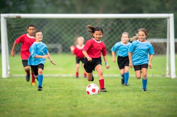 Kids playing soccer